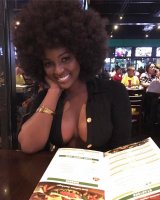 busty-woman-with-an-awesome-afro.jpg