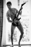 naked-man-playing-guitar-2.jpg