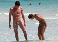 11039-Nudist-couple-on-sunny-exotic-beach.jpg